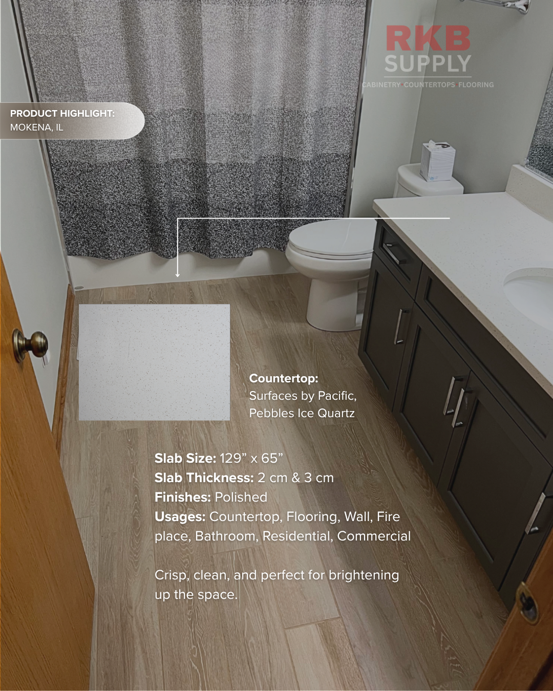 Bathroom vanity featuring Surfaces by Pacific Pebbles Ice Quartz countertop with dark shaker vanity in Mokena, IL.